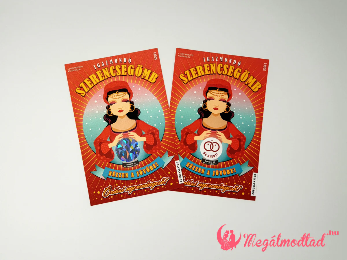 Szerencsegömb kaparós sorsjegy esküvői meghívó lekapart gömbbel, ahol az „Ön nyert” szöveg látható